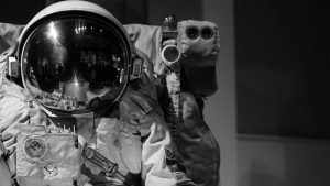Black and white image of space suit.
